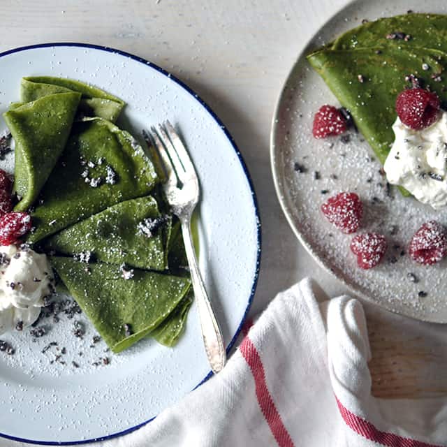 Matcha Crepes with Whipped Cream, Berries, and Cacao Nibs