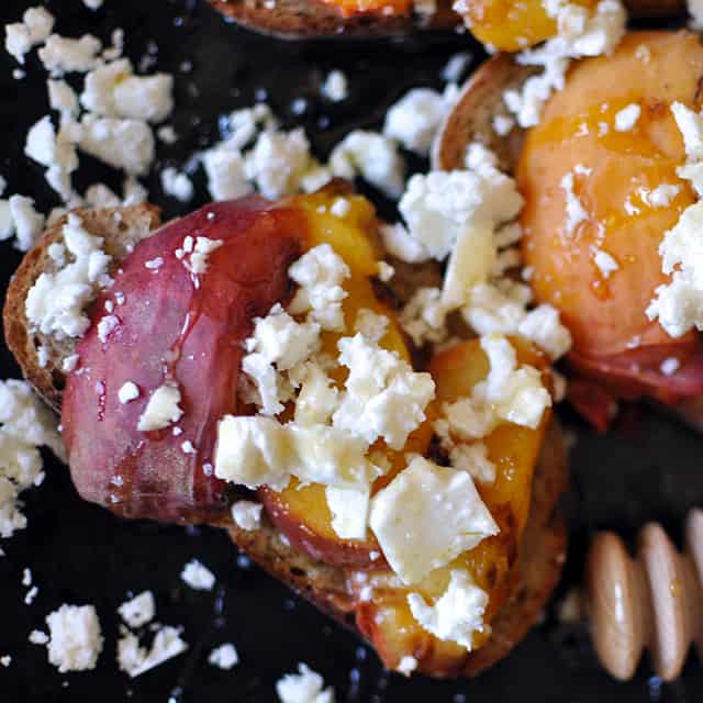 Grilled Peach Crostini with Feta and Fir Honey