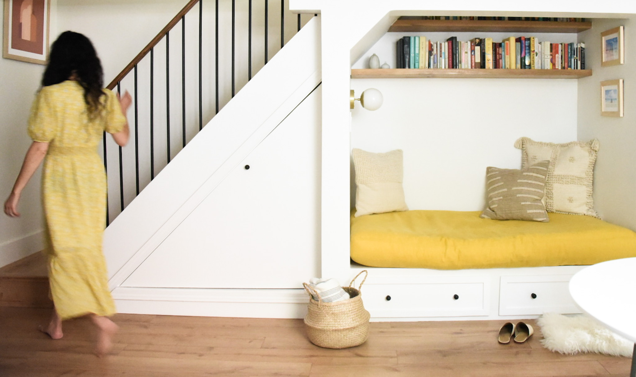 How a Seattle family of five turned a dark family basement in their 1930s tudor into a bright and airy multi-purpose workspace and playroom (with a cozy under stair reading nook!). 