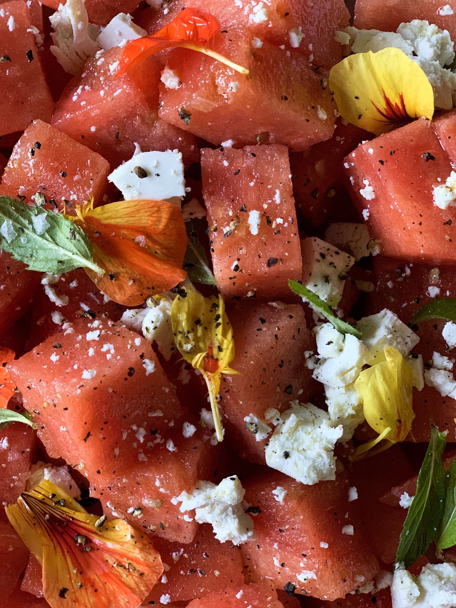 Watermelon Salad with Ricotta Salt, Mint, and Edible Flowers