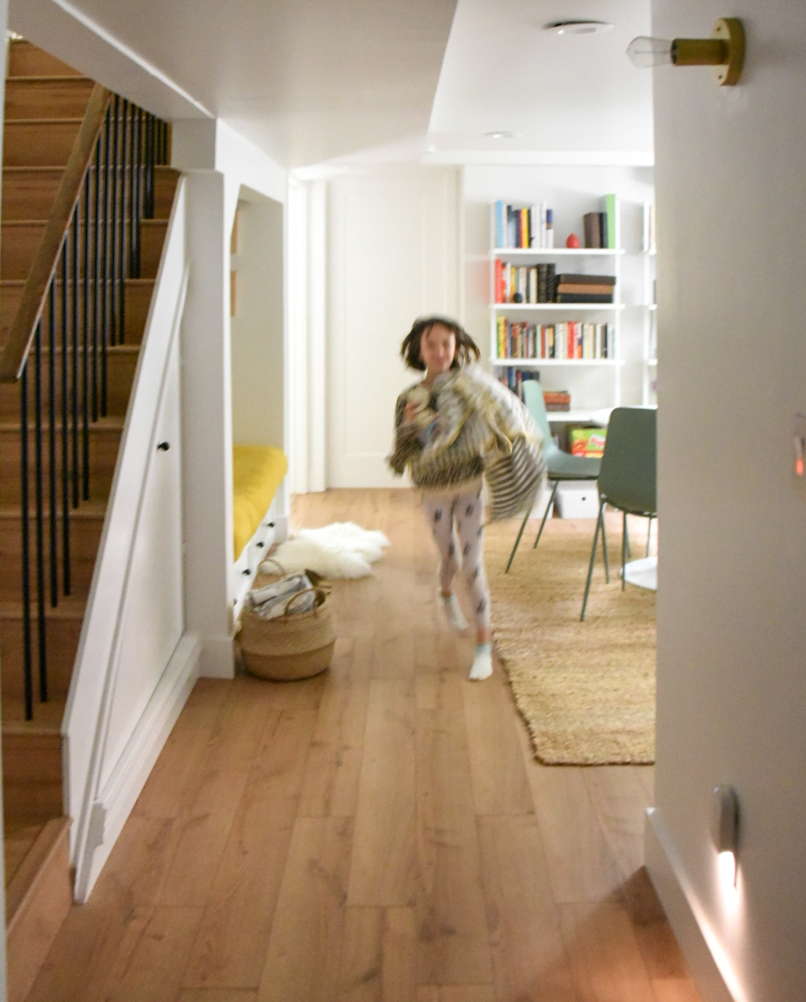 How a Seattle family of five turned a dark family basement in their 1930s tudor into a bright and airy multi-purpose workspace and playroom (with a cozy under stair reading nook!). 