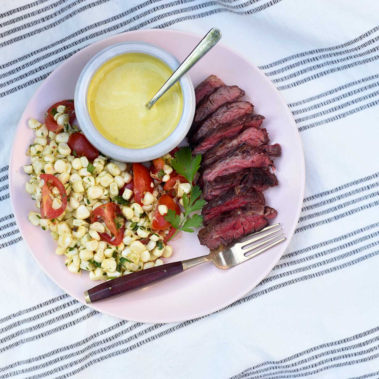 Hanger Steak with Mojo Sauce and Lime-Marinated Corn Salad
