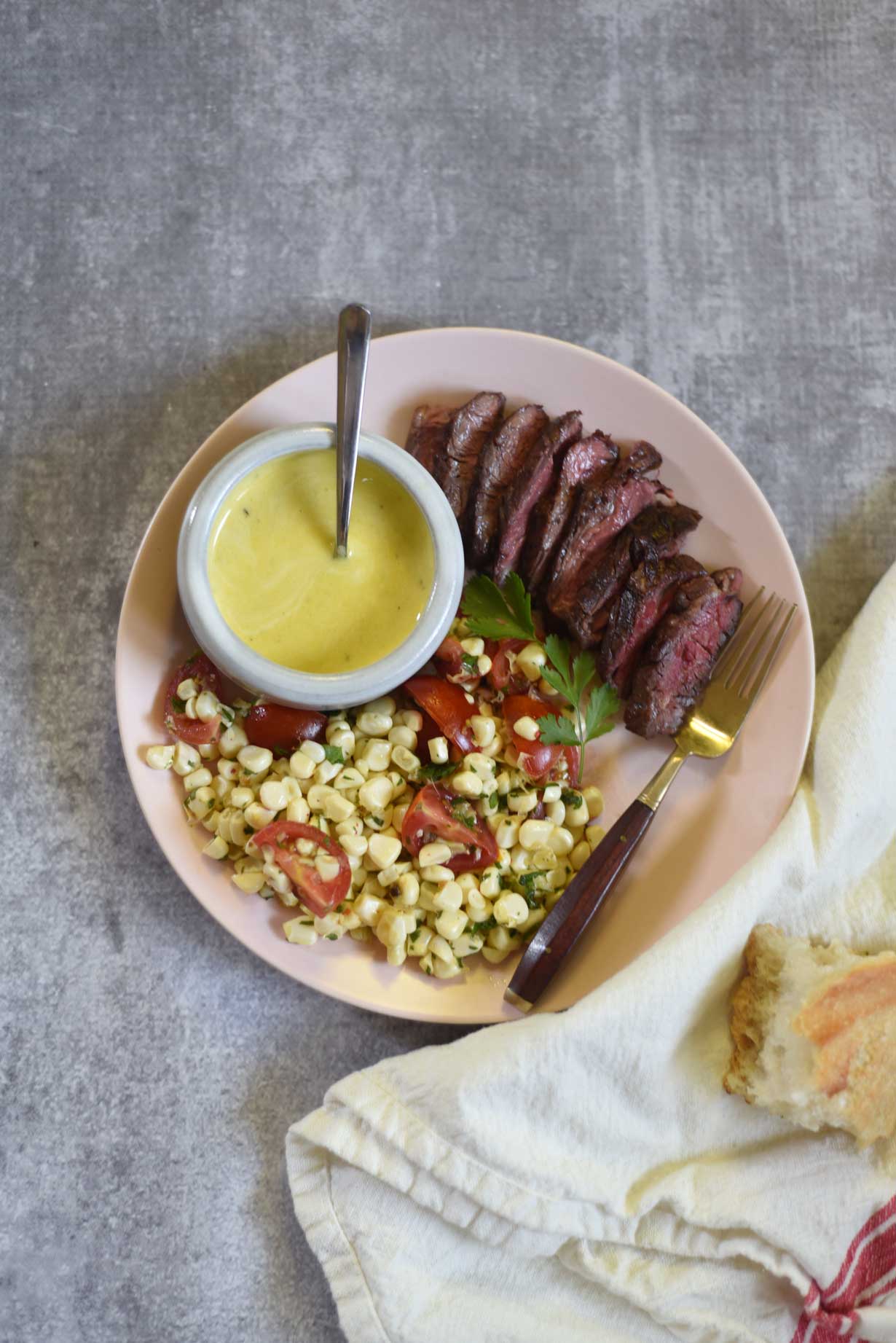 Hanger Steak With Mojo Sauce And Lime Marinated Corn Salad