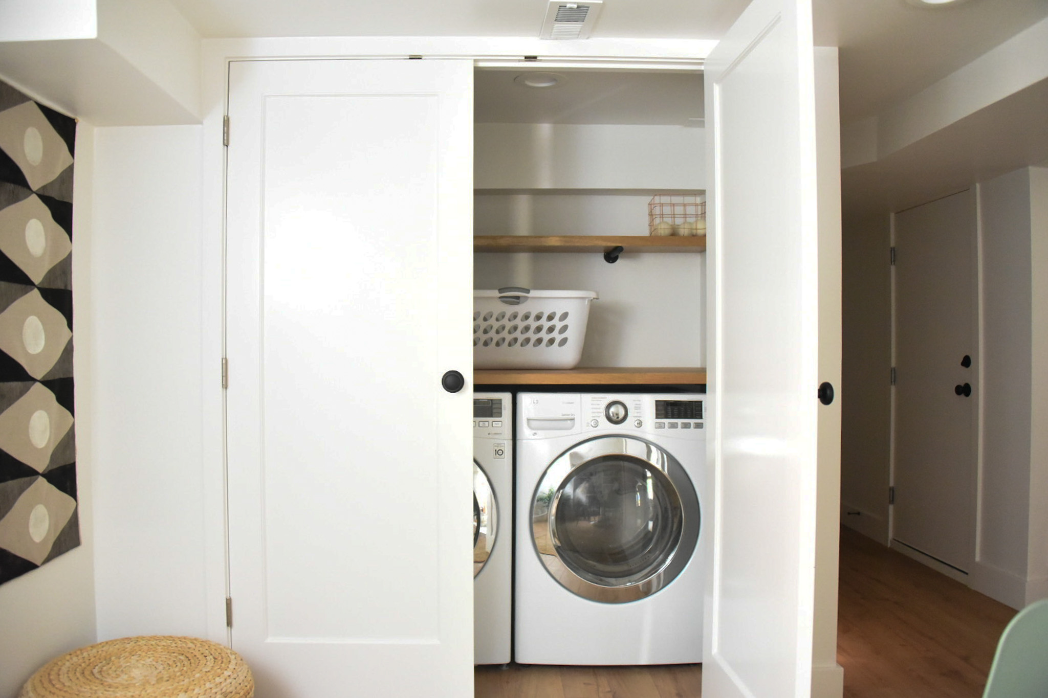 How a Seattle family of five turned a dark family basement in their 1930s tudor into a bright and airy multi-purpose workspace and playroom (with a cozy under stair reading nook!). 