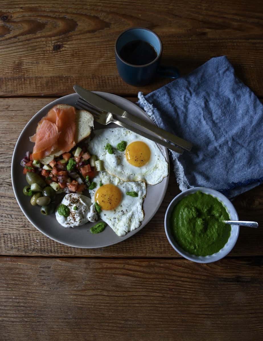 It’s the sum of its parts that makes this Israeli breakfast plate -- complete with a simple, spicy green schug -- one to remember.