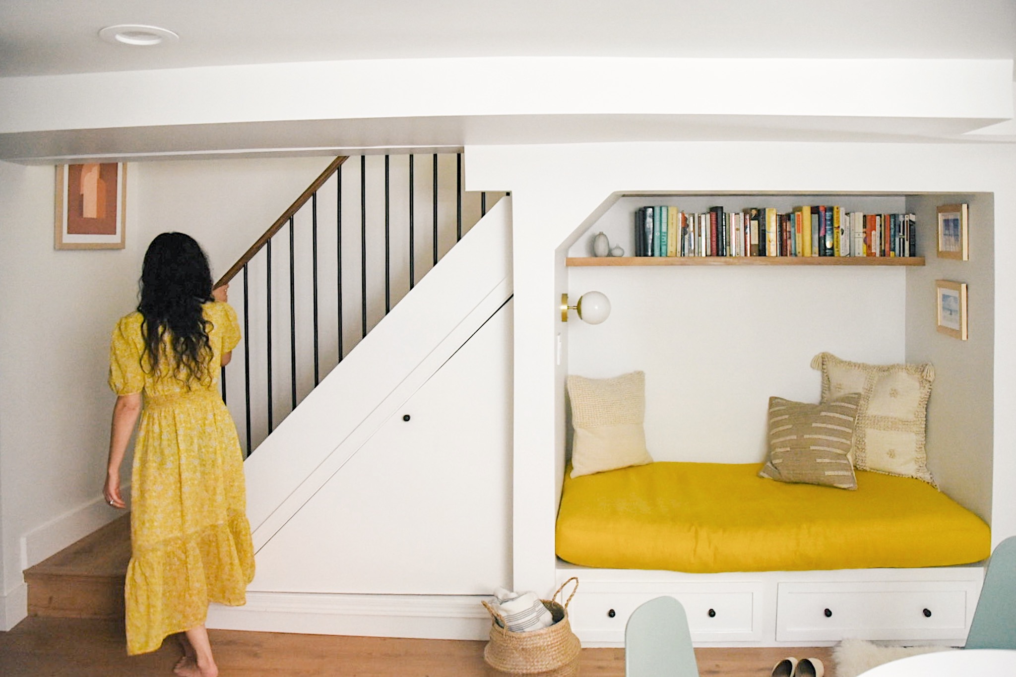 How a Seattle family of five turned a dark family basement in their 1930s tudor into a bright and airy multi-purpose workspace and playroom (with a cozy under stair reading nook!). 