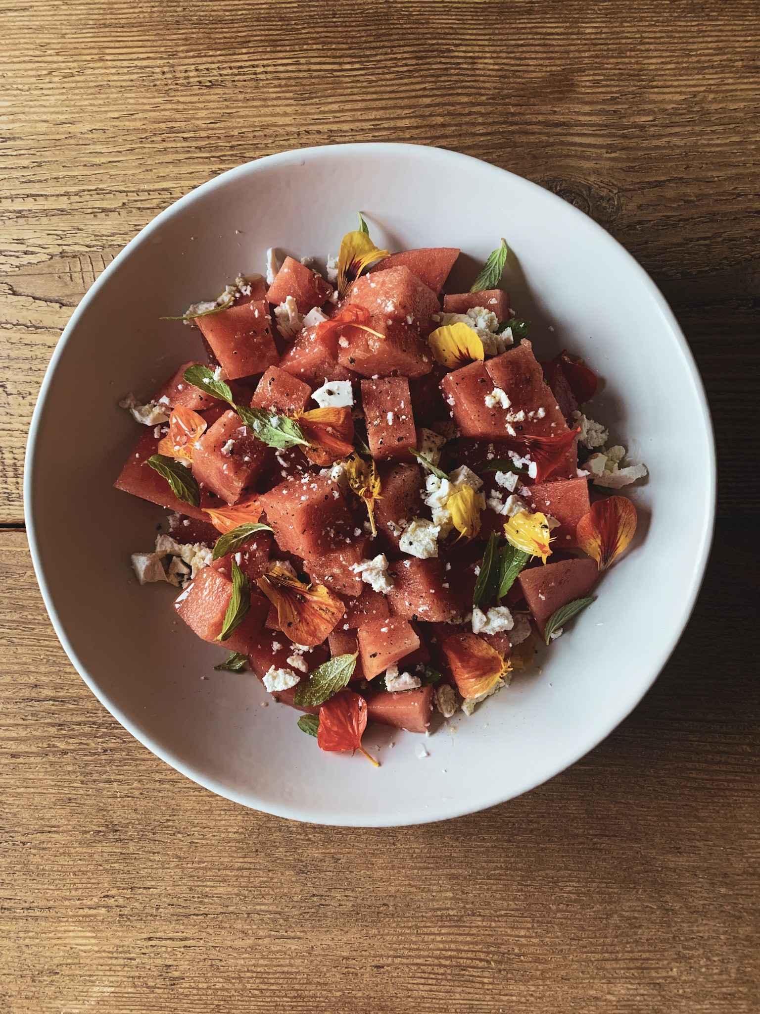 Watermelon Salad with Ricotta Salt, Mint, and Edible Flowers